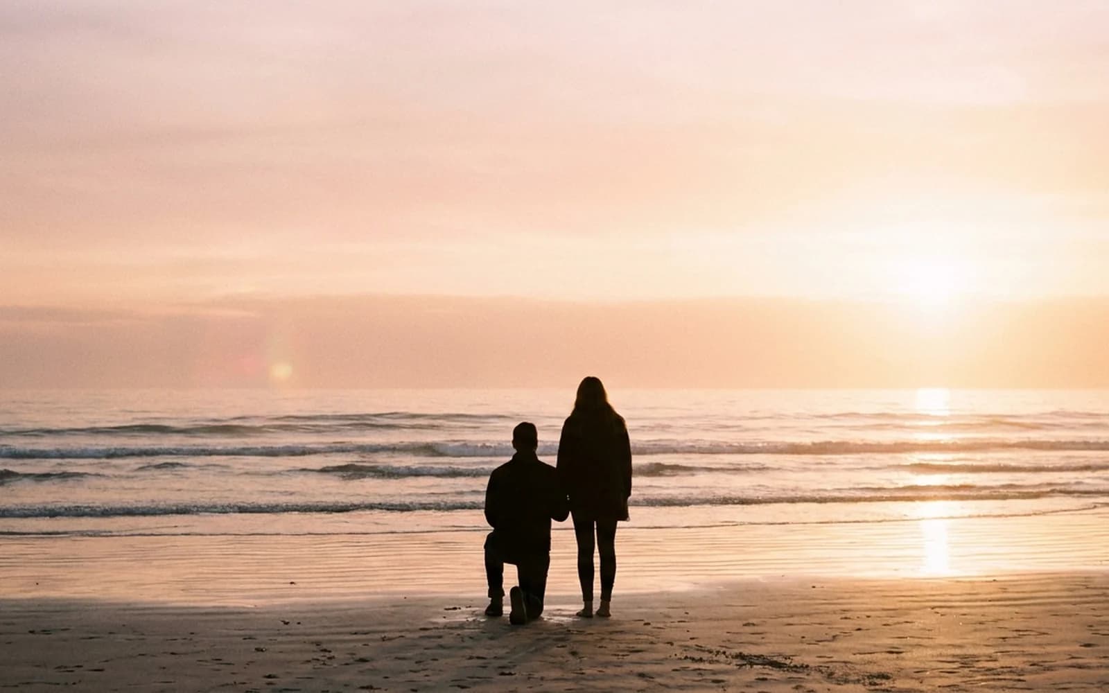 Sunset beach proposal silhouette on an Adelaide beach